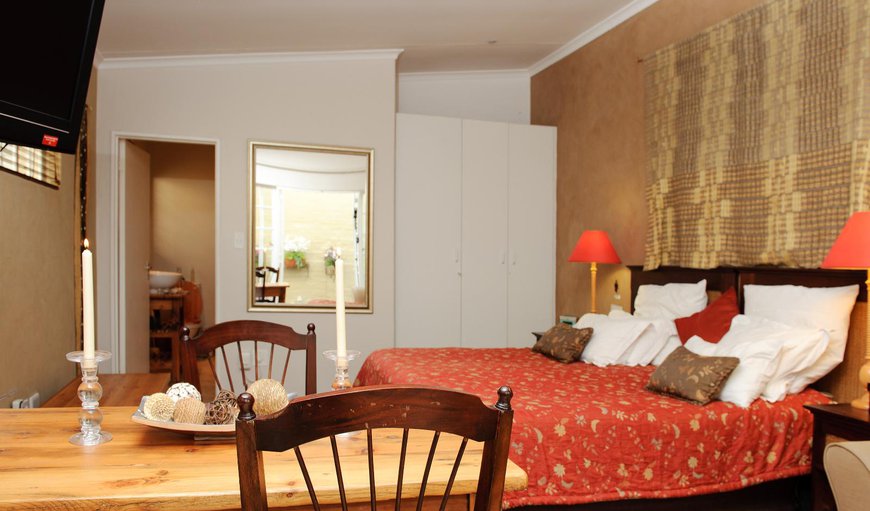 Studio Flatlet King/twin(Ochre) - Bedroom with a king size bed or twin beds and a double sleeper couch Studio Flatlet King/twin(Ochre) - Bedroom with a king size bed or twin beds and a double sleeper couch
