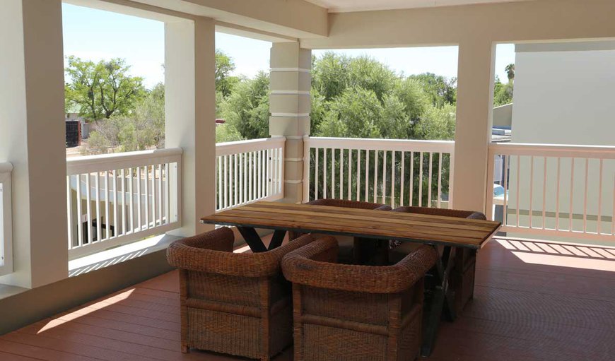 Triple Room: Large balcony and seating area that overlooking the property.