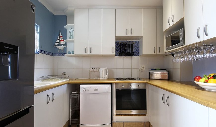 The kitchen is fully equipped with an oven, hob, microwave oven, dishwasher, fridge / freezer, washing machine, tumble dryer, coffee maker, slow cooker, toaster, crockery and cutlery as well as an iron and ironing board. The kitchen is fully equipped with an oven, hob, microwave oven, dishwasher, fridge / freezer, washing machine, tumble dryer, coffee maker, slow cooker, toaster, crockery and cutlery as well as an iron and ironing board.