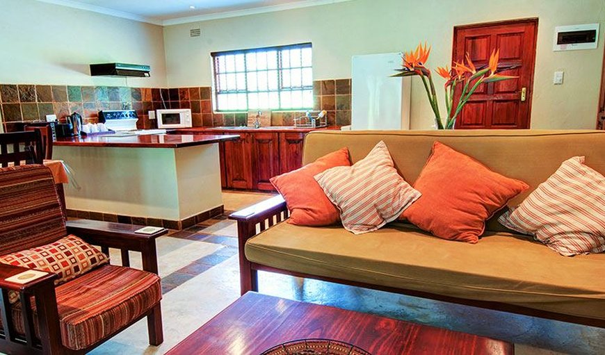 Cottage - The lounge area offers a TV, DVD and DSTV decoder with limited channels (please bring your own decoder if you want the full DSTV package). Cottage - The lounge area offers a TV, DVD and DSTV decoder with limited channels (please bring your own decoder if you want the full DSTV package).