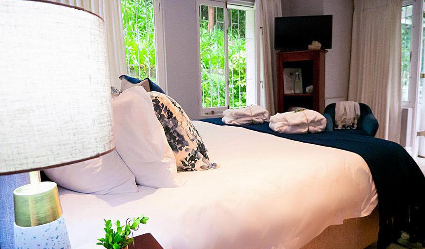 Luxury Garden-Facing King or Twin Room - Bedroom with a king size bed or two twin beds (please request) Luxury Garden-Facing King or Twin Room - Bedroom with a king size bed or two twin beds (please request)