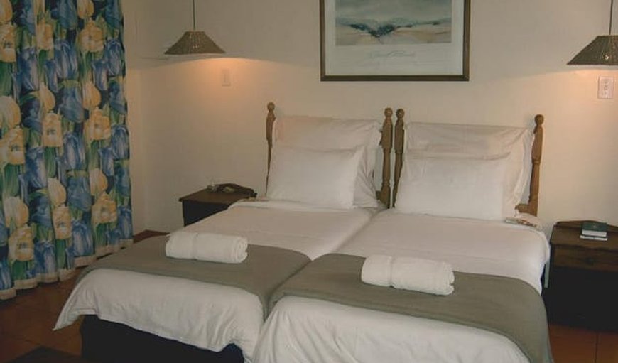 Deluxe Room: Beds can be either 2 Single Beds or 1 King Bed