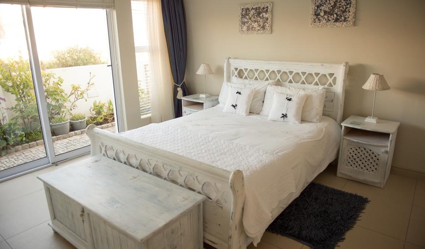 All room are queen size beds for comfort!
This is bedroom 2 which is downstairs and has access to the beach through the sliding doors. All room are queen size beds for comfort!
This is bedroom 2 which is downstairs and has access to the beach through the sliding doors.