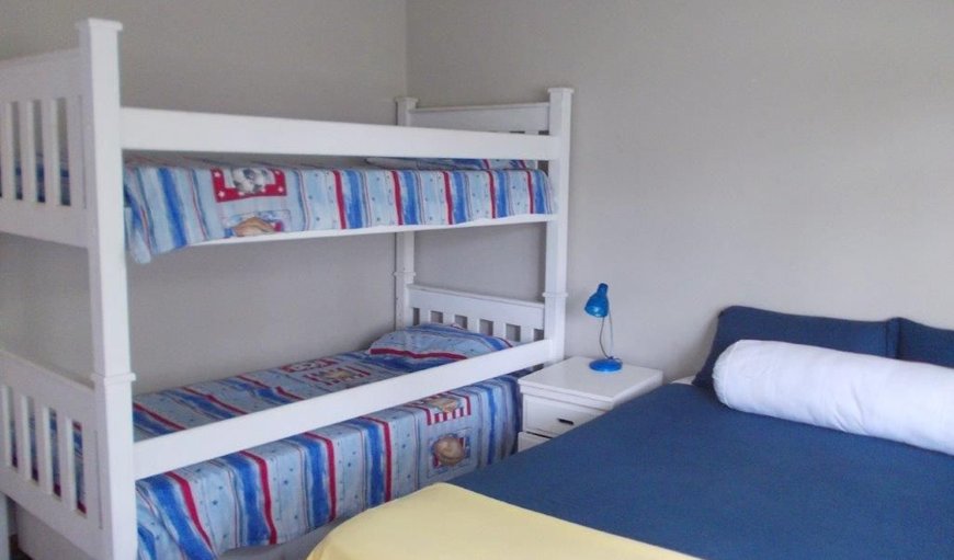 Self Catering - Cottage: Second bedroom with a queen bed and a bunk bed
