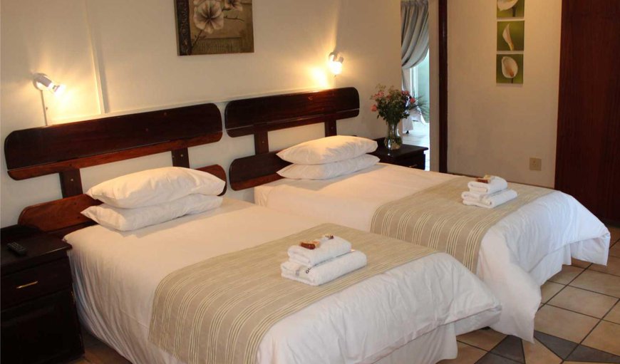 Family Room: Family Suite - This suite is furnished with a double bed and two 3/4 beds