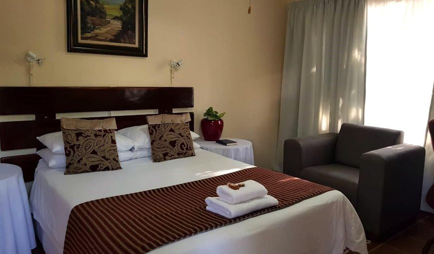 Standard Room: Standard Room - This bedroom is furnished with a double bed