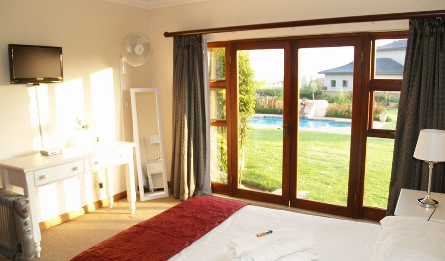 The guest rooms are tastefully furnished with a double bed, a TV and selected DSTV channels, a fan and coffee/tea making facilities. The guest rooms are tastefully furnished with a double bed, a TV and selected DSTV channels, a fan and coffee/tea making facilities.