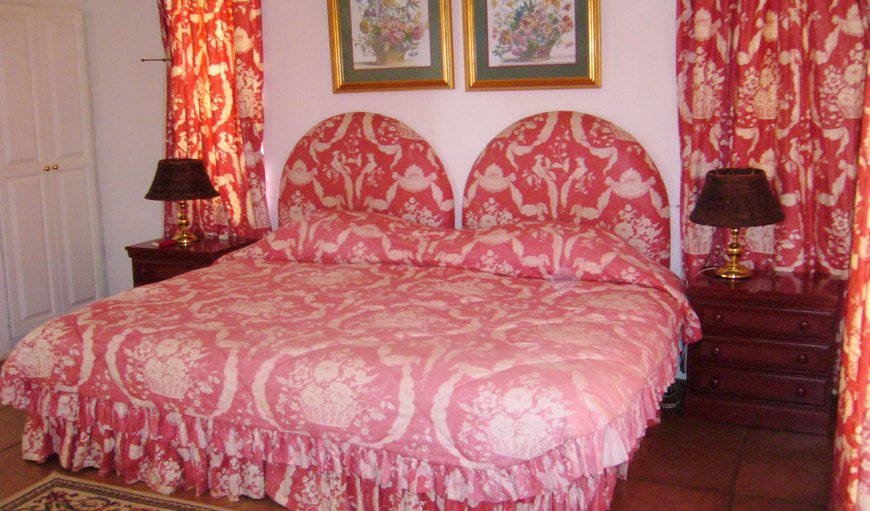 Red Room: Red Room - Bedroom with a king size bed that can be converted into 2 single beds