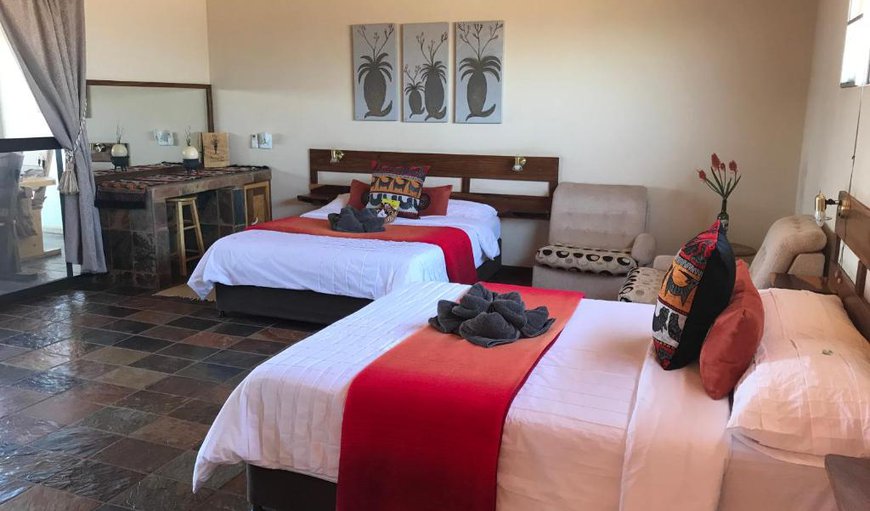 Luxury room: Each Family Room is furnished with 2 double beds as well a braai facilities to use.