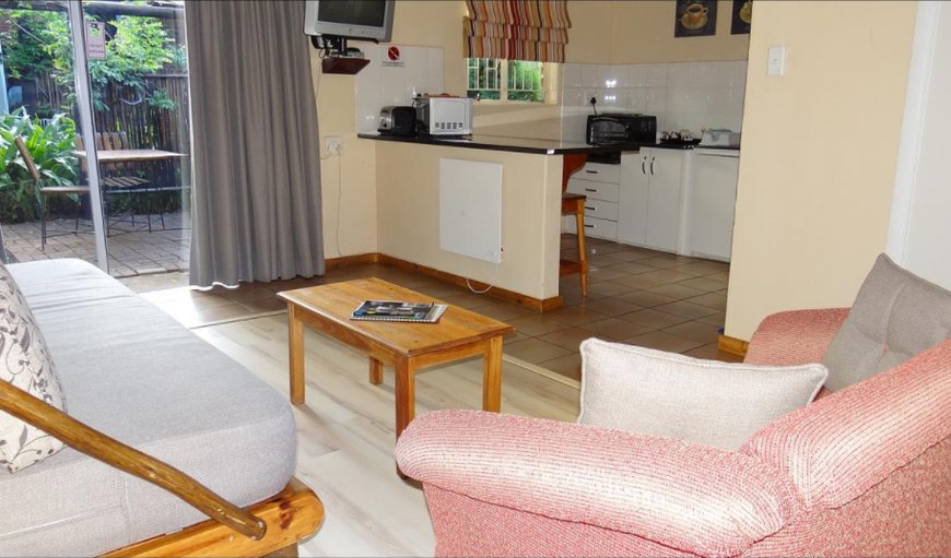 One bedroom Chalet: One bedroom chalet lounge area with kitchenette.