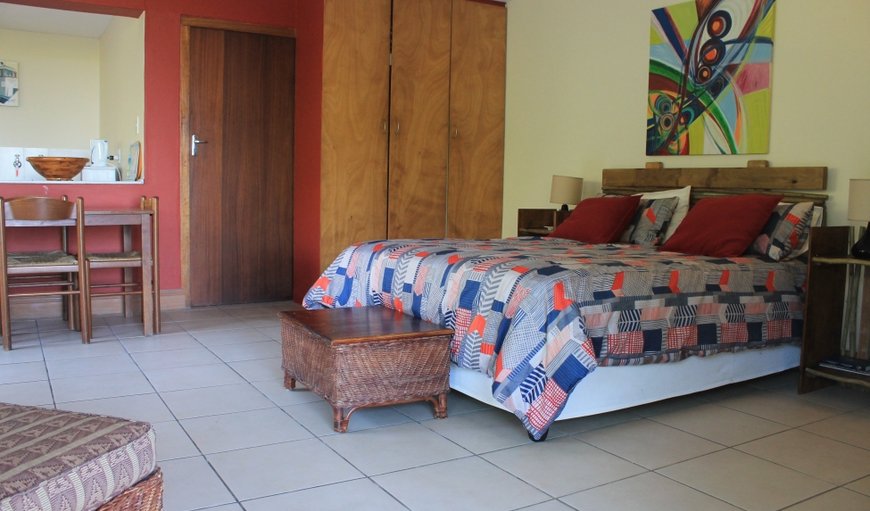 Dolphin View bedroom includes a queen-size double bed and is flanked by the en-suite bathroom, equipped with modern amenities. Dolphin View bedroom includes a queen-size double bed and is flanked by the en-suite bathroom, equipped with modern amenities.