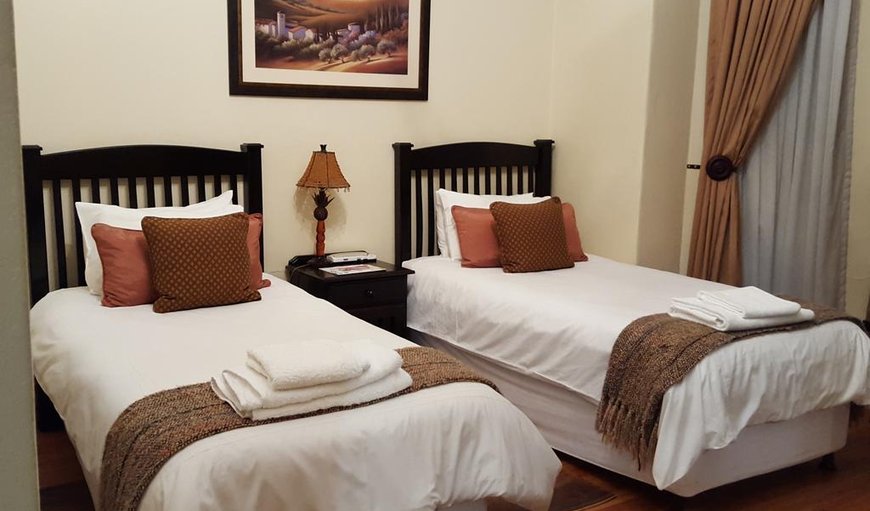 Twin Room: Twin Room - The twin room is furnished with two single beds and has a private bathroom.