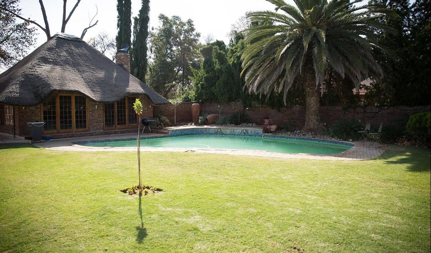 Garden and pool area in Christiana, North West Province, South Africa