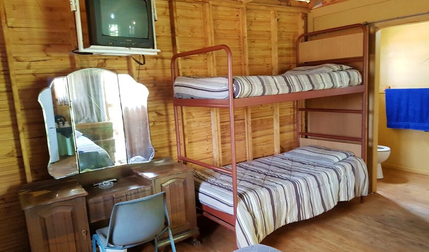 Room 4: Room 4 - Bedroom with a double bed and a bunk bed