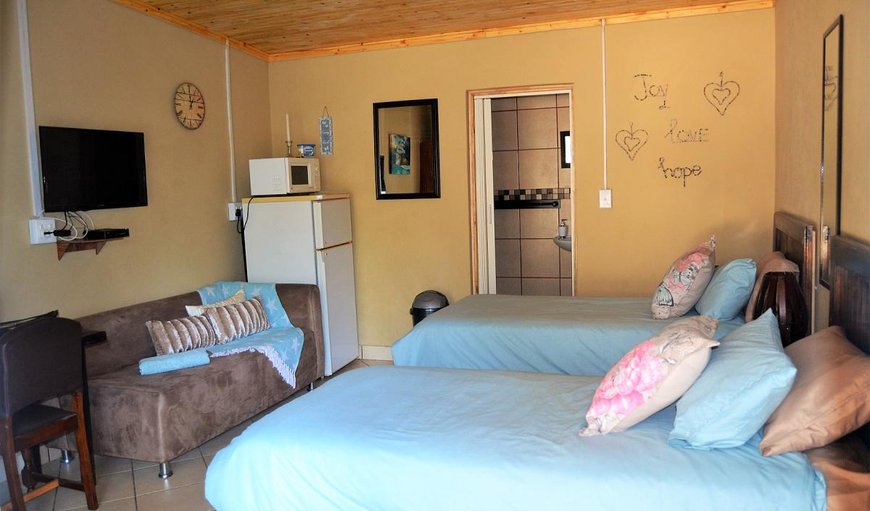 2 Sleeper Unit: 2 Sleeper Unit bedroom with twin single beds.