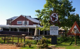 Bohemian Garden Cottages image