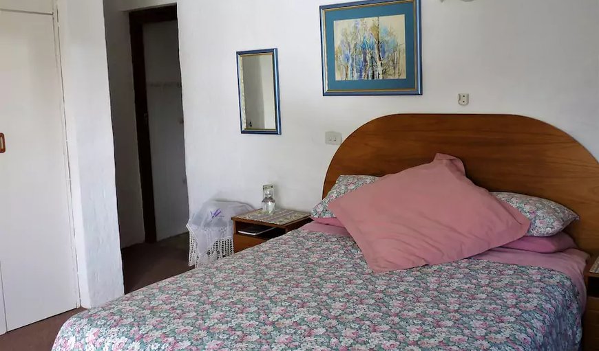 Double Room 1 (Downstairs): Bedroom with double bed.