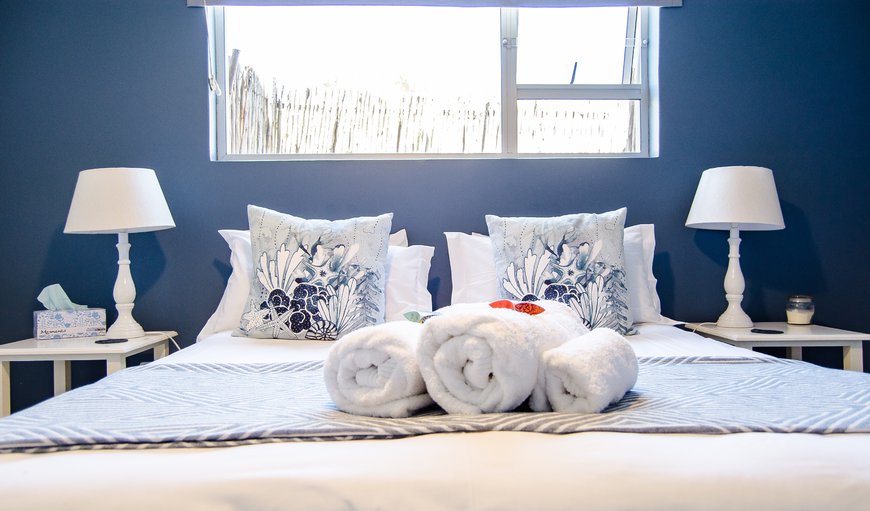 Water's Edge 1 - Luxury beach apartment: Bedroom queen bed