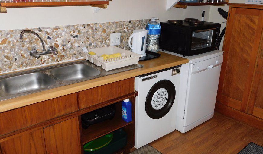 The apartment is equipped with a safe, microwave, kettle, two plate stove and oven and a fridge/freezer. The apartment is equipped with a safe, microwave, kettle, two plate stove and oven and a fridge/freezer.