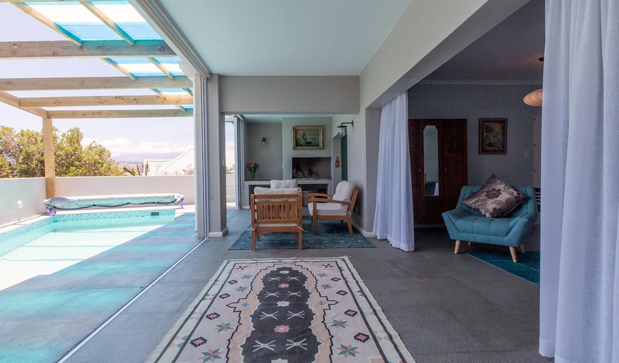 When opened, the sliding doors dividing the indoor living area and the outdoor recreational terrace