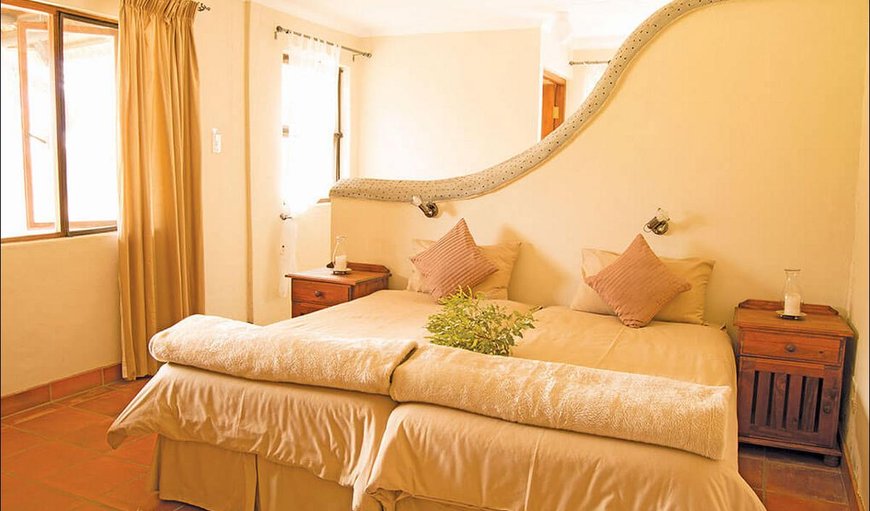 Self-catering Suites: Buffaloland Safaris - Giraffe Camp Self-catering Suites Queen Bed/Two Single beds.