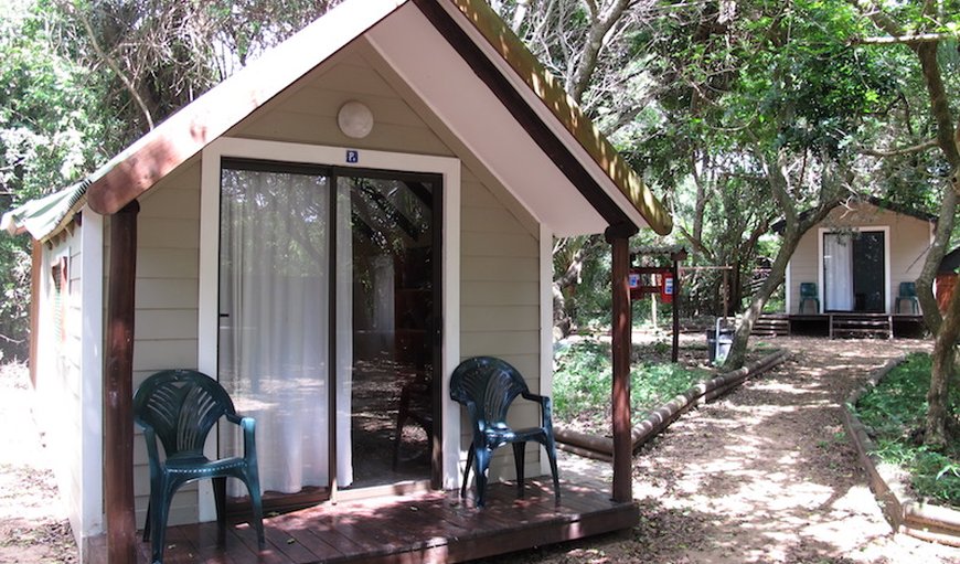 Standard Cabin & Private Bathroom: Standard Cabin & Private Bathroom and chairs on the patio.