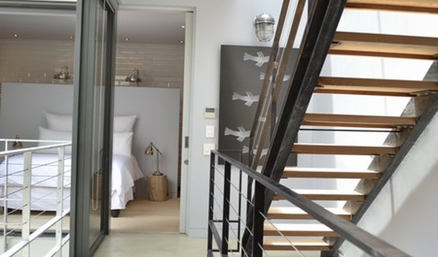 76 Waterkant Street: Staircase and view of bedroom 1