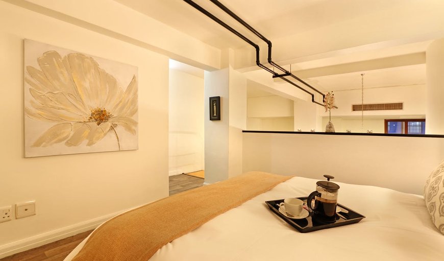 Afribode's Summer Breeze: Loft Bedroom with Queen Bed