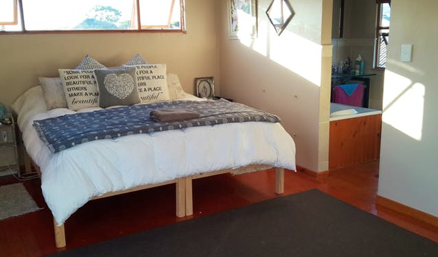 Main bedroom with a queen size bed. in Gordon's Bay, Western Cape, South Africa