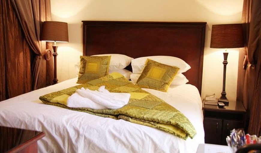 Double Deluxe Room: Double Deluxe Room - Bedroom with a double bed