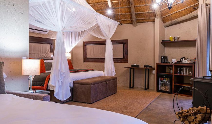 River Lodge Family Suite: River Lodge Family Suite - The suite is furnished with a queen size bed and a sleeper couch suitable for 2 children under 12