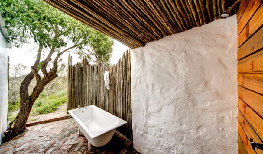 Outdoor bathrooms for each room, allowing you to shower in a natural setting or gaze up at the stars from a warm bath. Outdoor bathrooms for each room, allowing you to shower in a natural setting or gaze up at the stars from a warm bath.