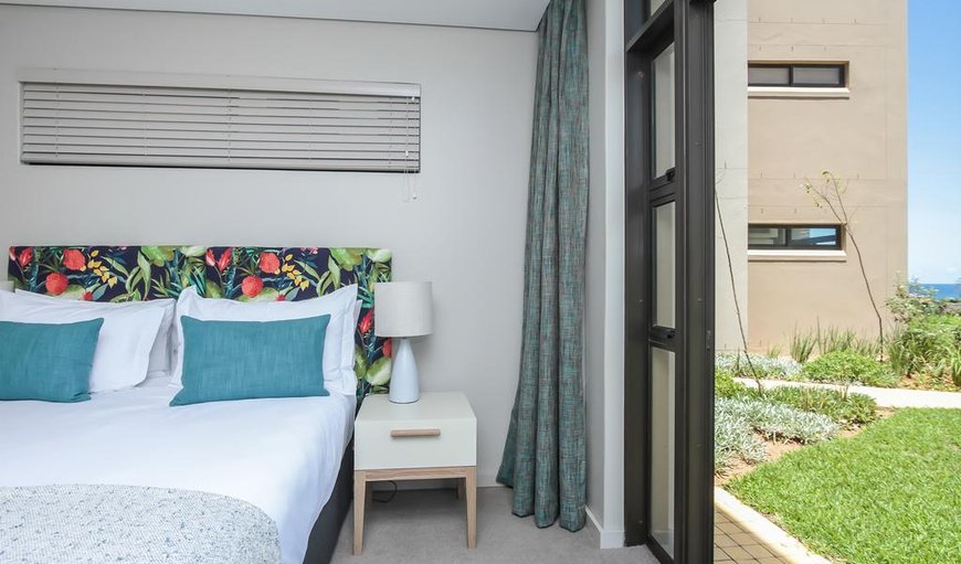 110 Zimbali Suites Sea Views 4 Sleeper: Main Bedroom with Sliding Doors leading to the Garden