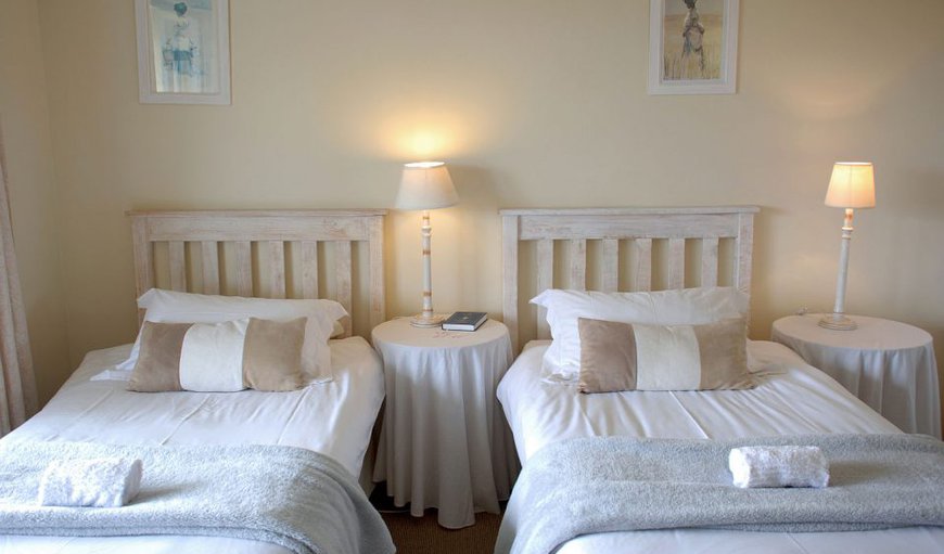 Double/Twin Suite with Sofa and Balcony: Our rooms are chic and elegant equipped with a comfortable bed and crisp white linen for you to get the best sleep possible, both twin and doubles are available