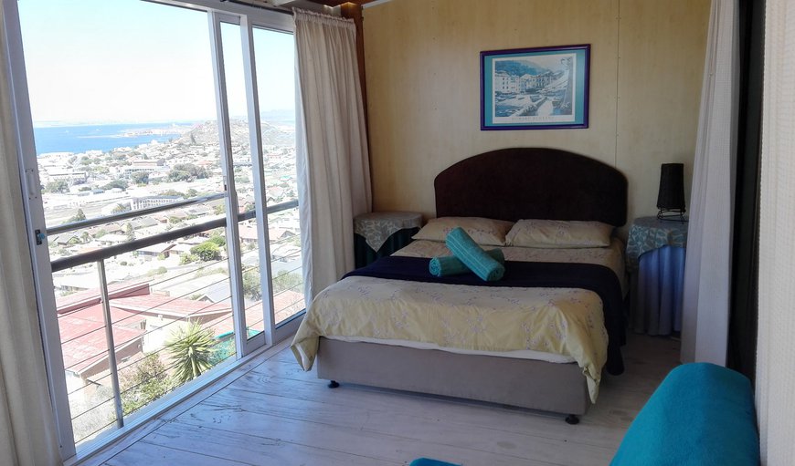 Unit 2: The first bedroom is furnished with a double bed and offers beautiful views.