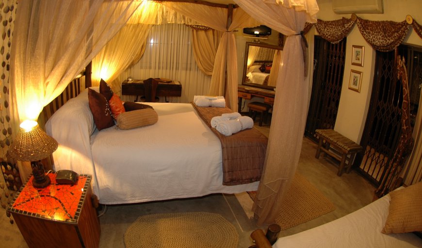 Luxury Room 1 - Giraffe: Bedroom with a double bed