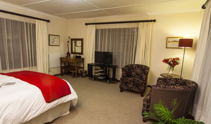 Luxury Suite: Luxury Suite - Bedroom with a queen size bed