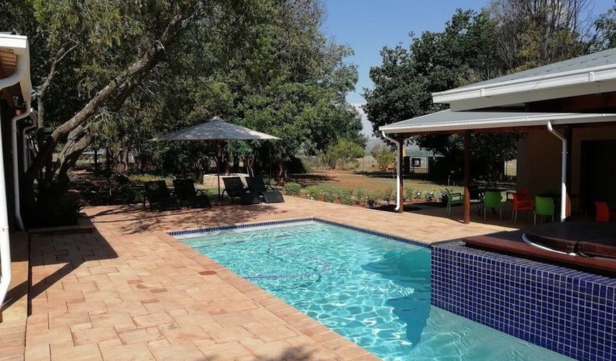 A communal swimming At the Crafters Lodge there is a communal covered patio with built-in braai and a separate fire pit as well as a swimming pool and Jacuzzi. A communal swimming At the Crafters Lodge there is a communal covered patio with built-in braai and a separate fire pit as well as a swimming pool and Jacuzzi.