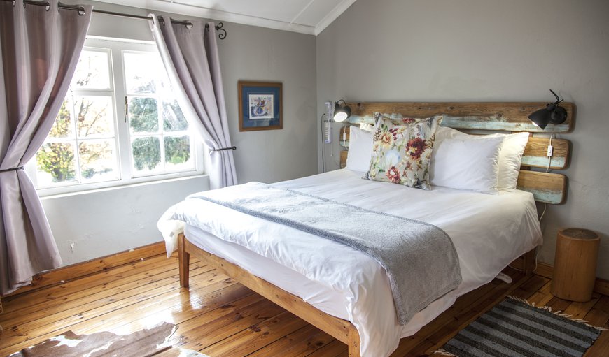 African Delight - family farm cottage: Bedroom with Double Bed