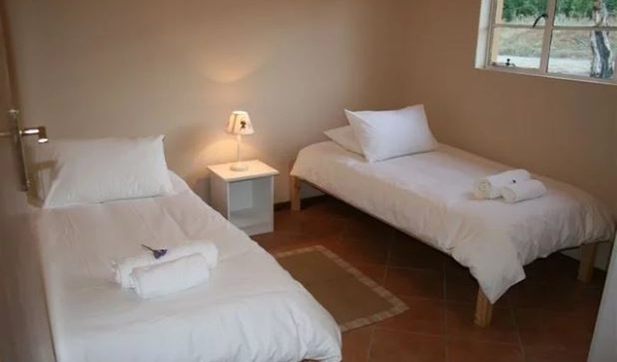 The Cottages: Second bedroom with twin single beds