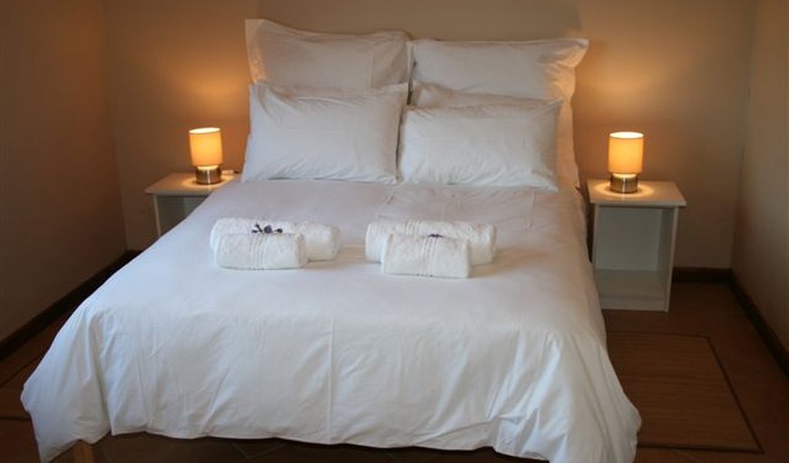 The Cottages: Main bedroom with double bed