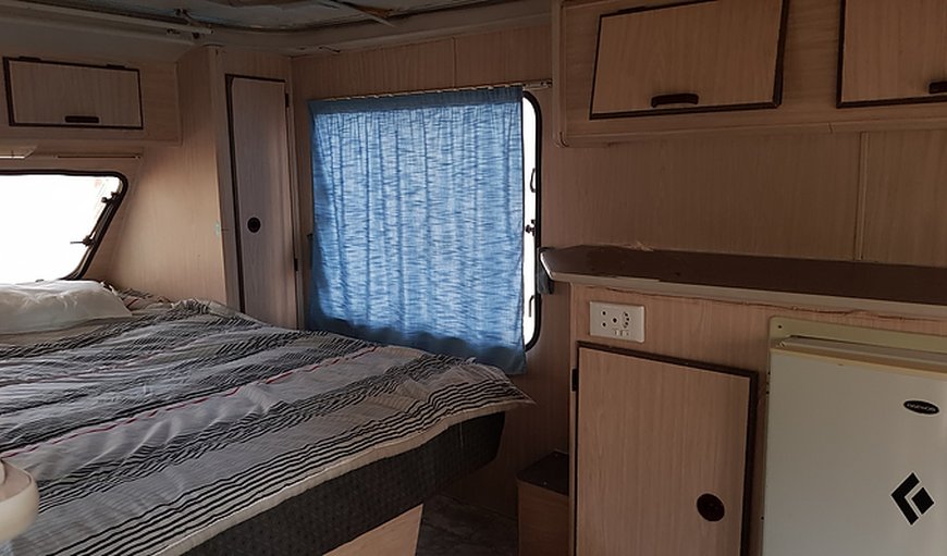 Campsite Caravan: Double bed and fridge