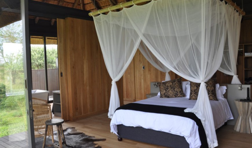 Imvubu Lodge 78: Bedroom with a queen size bed
