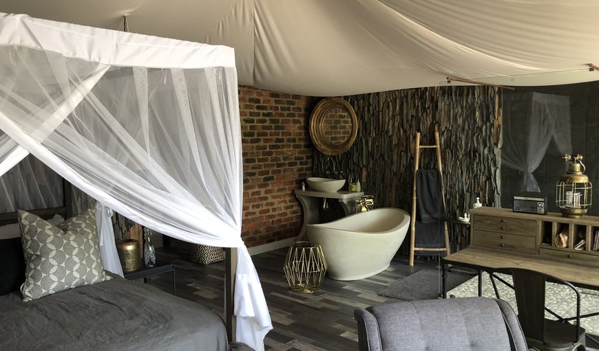 Luxury Tent: Our rooms are tastefully decorated and fitted with comfortable beds with soft sheets to offer you the best sleep possible - Luxury tent