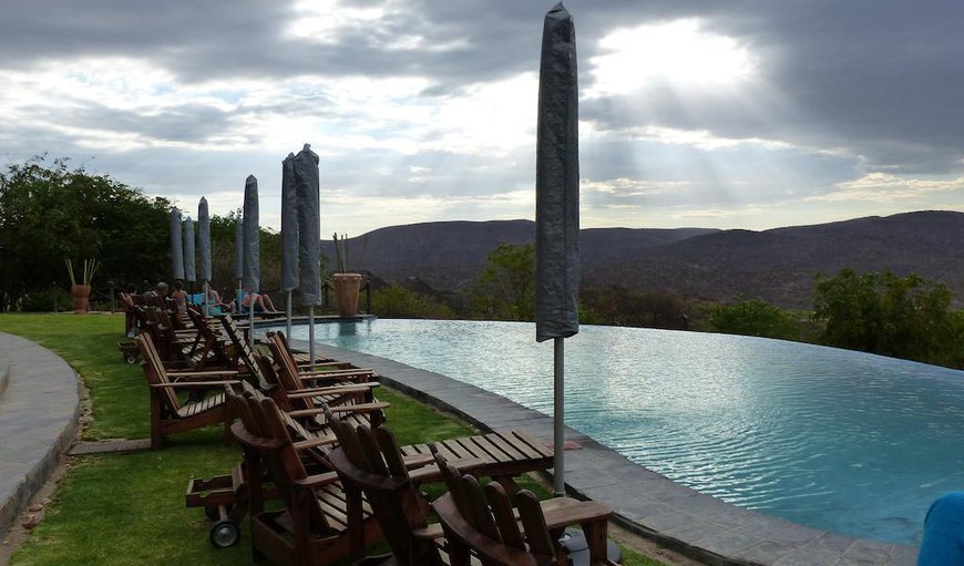 Deck chairs and umbrellas set the scene for a relaxed day around the pool or cool off after a hard day's drive.