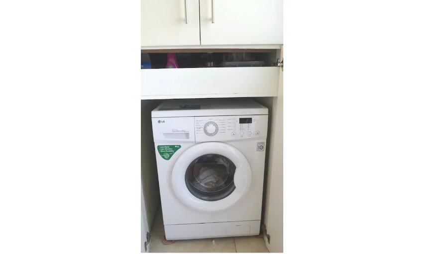 The kitchen is equipped with a fridge/freezer, a microwave, an oven and stove, and cutlery and crockery, as well as a washing machine for guest’s convenience. The kitchen is equipped with a fridge/freezer, a microwave, an oven and stove, and cutlery and crockery, as well as a washing machine for guest’s convenience.