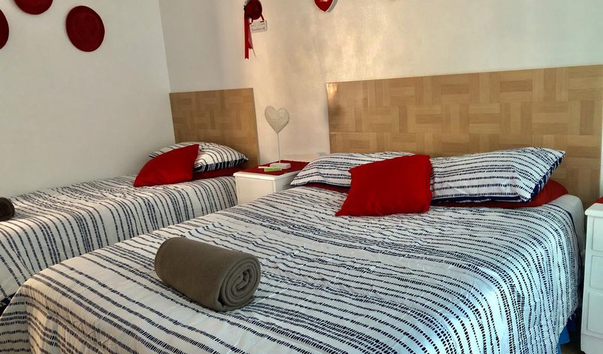 Octopus Nest: Family Room - The family room is furnished with a double bed and a single bed, a coffee station and a hairdryer.