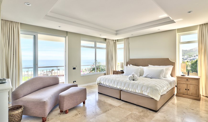 The luxurious master bedroom is at the top level of the house and offers an extra large king size bed and offers an en-suite bathroom with a bath and shower. The luxurious master bedroom is at the top level of the house and offers an extra large king size bed and offers an en-suite bathroom with a bath and shower.