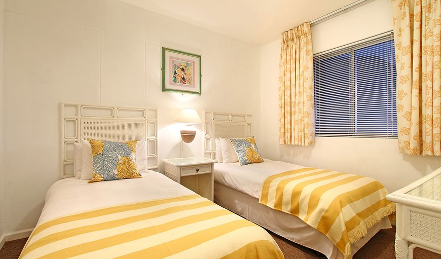 Dolphin Beach H104: The second and third bedroom contain two single beds sharing a separate bathroom.