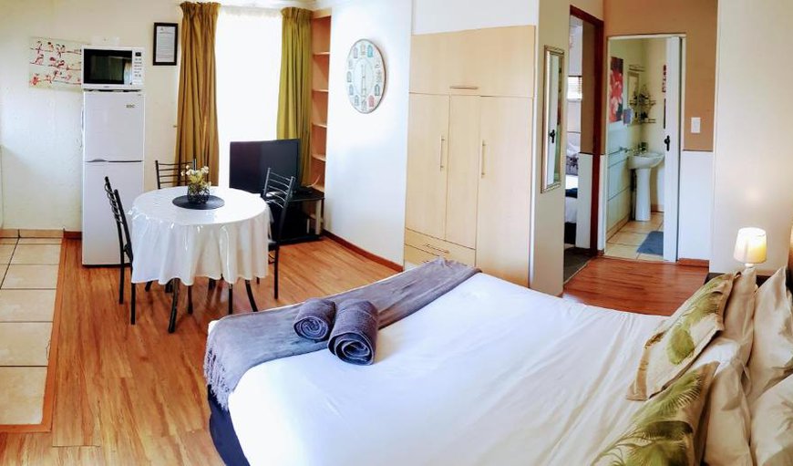 UNIT 12B: Double Bed in Living Area